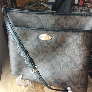 Dark brown and Black Coach Crossbody